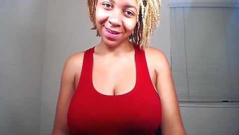 Blonde chick is with her sexy body and big tits on camera