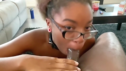 Ebony beauty is getting her mouth filled with a big dick