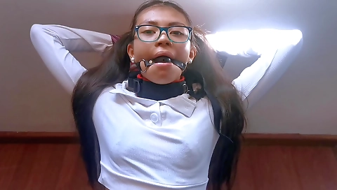 Sexy ebony woman in tight bondage is playing with her pussy