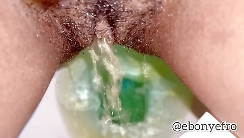 Ebony beauty with beautiful skin pees in solo porn