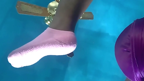 Ebony slut has a solo porn video and some feet in it