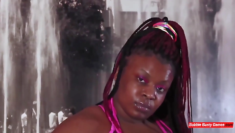 Ebony beauty with a tattooed pussy sucks a big cock