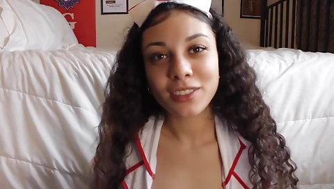 Nasty brunette nurse masturbates with dildo in webcam