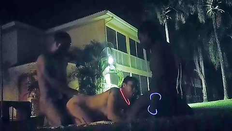 Ebony black teen with a big booty gets fucked in an outdoor threesome