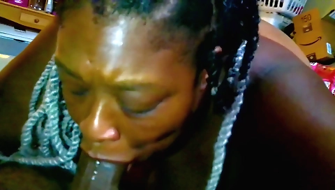 Ebony milf with a hairy pussy deep throats on cock