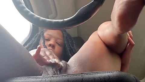 Ebony woman is wearing her bra and bra and is doing it