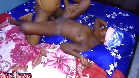 African couple gets nude on the couch and play with toys