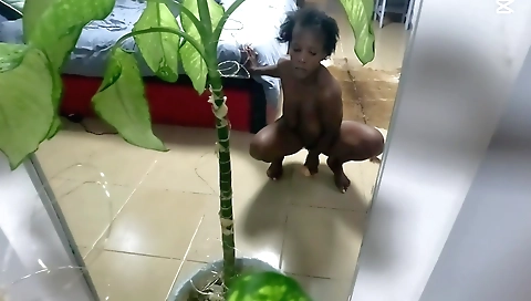 Ebony lady sucks a black cock and plays with her clit