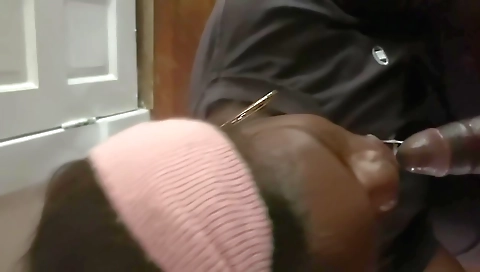 Ebony woman giving the guy a hardcore blowjob at home