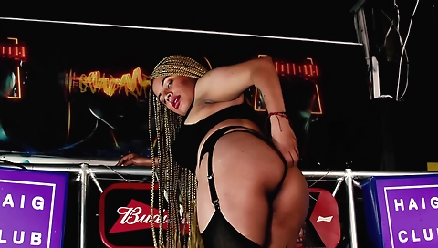 Gorgeous brunette with a tattoo shows off her sexy body