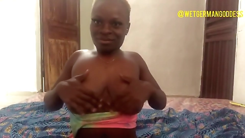 Ebony woman with big tits is showing her sexy body on web cam