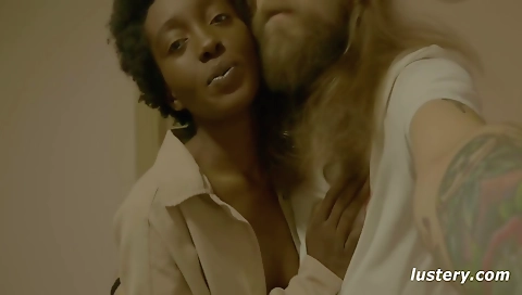 Ebony girl gives a hot blowjob to a big black cock